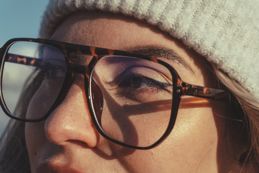 A girl side looking Wear Matte and transparent frame